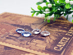 925 Sterling Silver Coated Oval Cut Stone Earrings - Topaz Blue