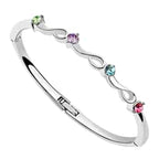 Sterling Silver Coated Cuff Bracelet with 4 Round Stones in a Wavy Design