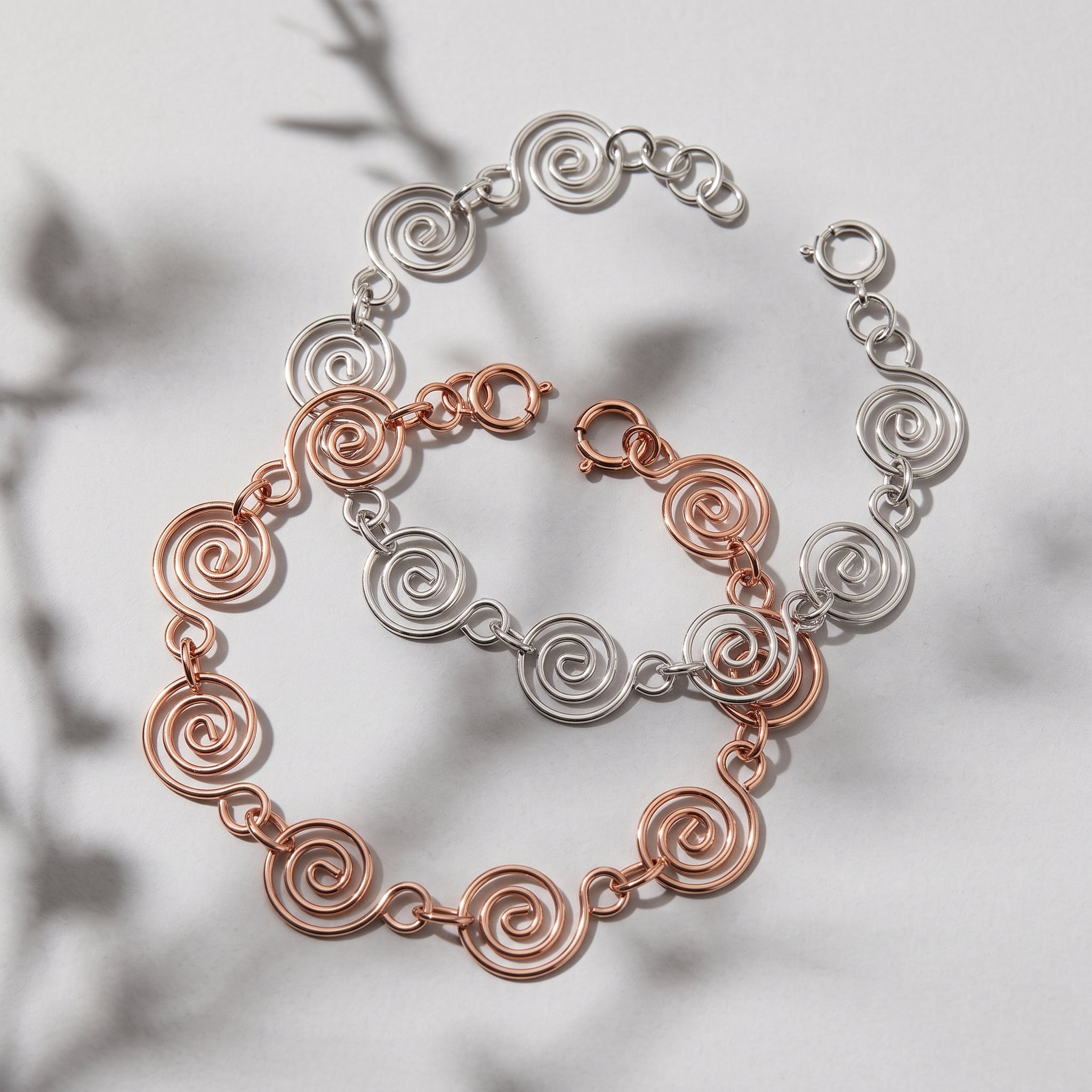 Spiral Chain Bracelet Linked Together in a Chain of 7 Spirals in Silver or 18K Rose Gold Coated